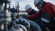© Emiliia - Two workers in hard hats and protective gear inspect and maintain machinery at an oil refinery under daylight.