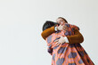 © Anna Malkova/Stocksy - friendly hug