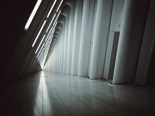 a very long room with some columns next to each other