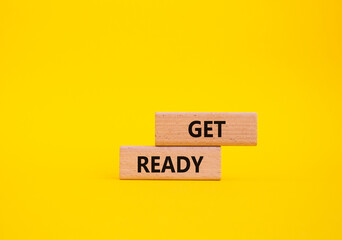 Wall Mural - get ready symbol. wooden blocks with words get ready. beautiful yellow background. business and get 