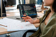 © DZ FILM/Stocksy - A female programmer in the office
