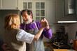 © Studio Firma/Stocksy - Couple dancing in kitchen
