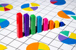 © Pixel Stories/Stocksy - Financial performance / statistics bar, pie charts