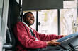 © Studio Firma/Stocksy - Happy bus driver