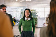 © VICTOR TORRES/Stocksy - Confident young asian woman at a casual office meeting