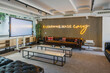 © VICTOR TORRES/Stocksy - Modern eLearning Lounge with Neon Sign and Stylish Decor