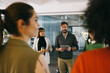© VICTOR TORRES/Stocksy - Cooperative team in casual business meeting space