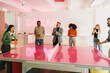 © VICTOR TORRES/Stocksy - Diverse Team Playing Ping Pong in Creative Office Space