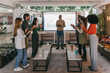 © VICTOR TORRES/Stocksy - Engaging Office Presentation with Team Applause