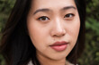 © nomad studio/Stocksy - Close-up portrait of a young asian woman