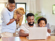 © peopleimages.com - Happy, black family and laptop to relax with dogs at house in kitchen browsing internet for online shopping pet care. Parents, child and animal for streaming website funny puppy video on vacation