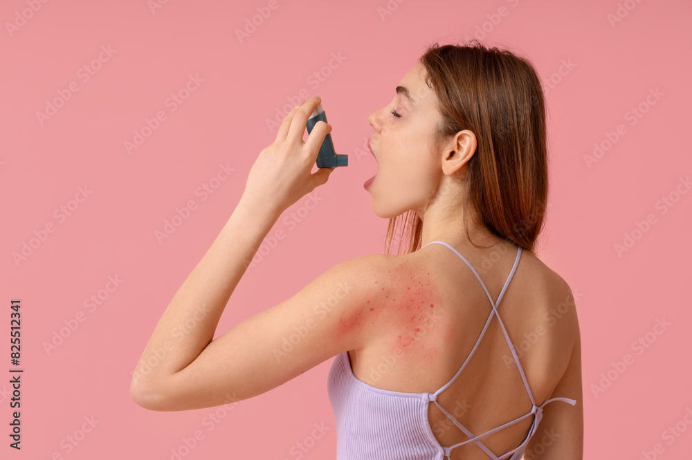 Woman with inhaler and rash having asthma attack on pink background