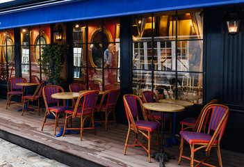Wall Mural - cozy street with tables of cafe in paris, france. cityscape of paris. architecture and landmarks of 