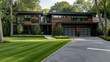© Matcha_09 - Exterior of a contemporary home with clean lines, a spacious driveway, and a beautifully manicured lawn