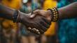 © KHF - A firm handshake between two adult men of different ethnicities outdoors, symbolizing agreement and partnership.