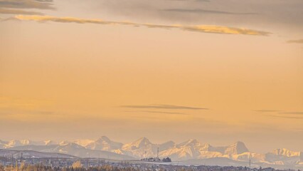 Wall Mural - dramatic sunrise, sunset time-lapse 4k footage b-roll of round down at horizontal mountain. sky in e