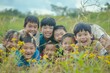 © Chacmool - Group of asian little children smiling and having fun in the field