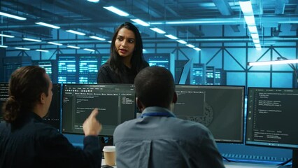 Poster - manager overseeing server room, walking around with checklist on laptop, troubleshooting hardware an