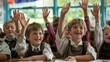 © chutikan - Schoolchildren enjoy answering questions in a primary school classroom.