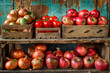 © BetterPhoto - A wooden crate with apples and onions on it