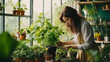 © Nittaya - Woman plant and take care trees in flowerpots as hobby and relax, house plant.