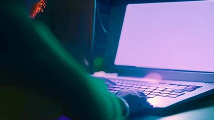 Poster - A cybersecurity analyst is typing on a laptop with a green light glowing in the background, A cybersecurity analyst examining a phishing email