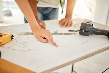 Poster - Architecture, hands and planning with blueprint on table for creativity, building design and pointing on paper. Architects, contractor or teamwork in floor plan, ideas or renovation project in office