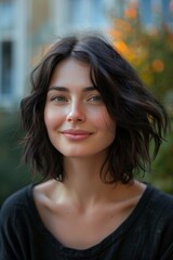 Wall Mural - Portrait of a young woman with short, shoulder length hair. have a beautiful smile