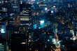 © song - City Skyline at Night: Aerial View of Illuminated Skyscrapers