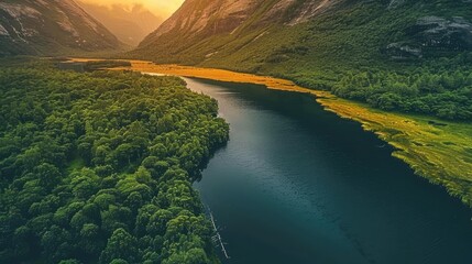 Poster - Breathtaking aerial view of a serene river winding through lush green valley, with mountains in the background at sunset.