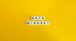 © photoopus - Data Mindset Banner. Text on Block Letter Tiles on Yellow Background. Minimal Aesthetics.