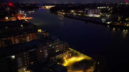Canvas Print - High Angle Night Footage of Illuminated Wandsworth Central London at River Thames, London, England UK. April 24th, 2024