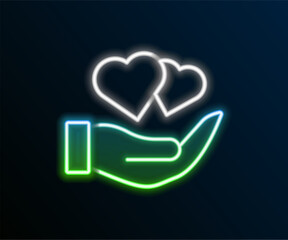 Poster - Glowing neon line Heart in hand icon isolated on black background. Hand giving love symbol. Valentines day symbol. Colorful outline concept. Vector