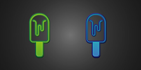 Poster - Green and blue Ice cream icon isolated on black background. Sweet symbol. Vector