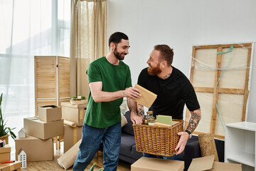 Wall Mural - Two men, a gay couple in love, stand side by side in a room surrounded by boxes, starting a new life in their new home.
