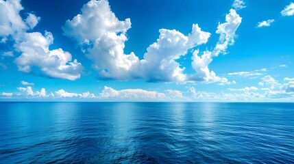 Wall Mural - blue sky and sea, blue ocean water, white clouds, clear horizon line, beautiful scenery, tranquil at