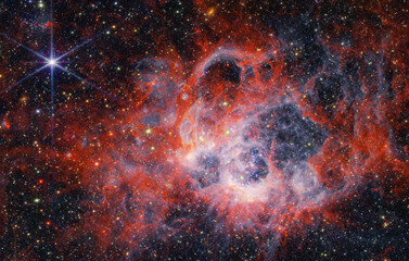 ngc 604 starforming nebula in the nearby triangulum galaxy by nasa