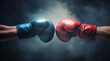 © Cadengo - Closeup two man hands in red and blue boxing gloves hitting each other on isolated dark misty background