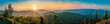 © PHTASH - Background banner panoramic view of the sunrise over the mountains in a proportion of 125 by 27.