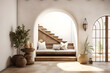 © Emongrapic - The interior design of a modern home entryway hall features a Mediterranean Boho aesthetic with an arched wall.