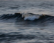 © Austockphoto - Wave breaking in simple scene