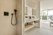 © ADDICTIVE STOCK - Modern Minimalist Bathroom with Natural Light