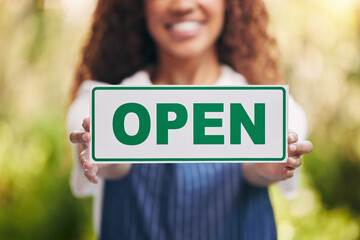 Wall Mural - Hands, florist and open sign with smile in garden for promotion, service and welcome to store. Woman, entrepreneur and happy at small business with signage board at eco friendly nursery for plants