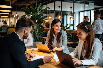 Poster - a group of people sitting at a table in an office, In an office setting, there is a gathering of individuals seated around a table.