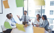 © peopleimages.com - Office, window and business people with meeting by table for sales planning, brainstorming and teamwork. Sticky note, employees and happy with discussion for review, kpi training or positive feedback