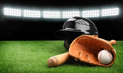 Sticker - Baseball bat, glove, helmet and ball on grass at stadium. Banner design with space for text