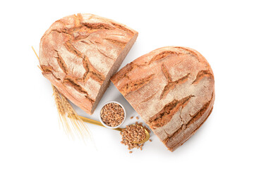 Wall Mural - Tasty bread with bowl and spoon of wheat grains on white background