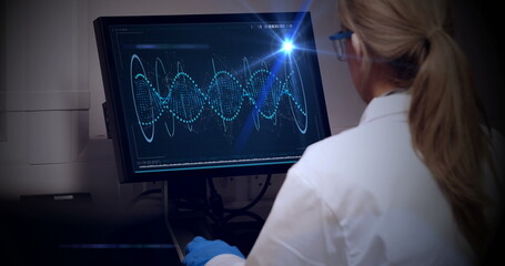 Poster - Caucasian scientist examining complex data on monitor