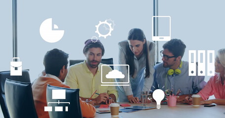Poster - Image of multiple digital icons against diverse colleagues discussing together at office