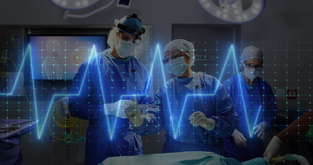 Poster - The surgeons are interacting with each other and the cardiograph is over a black background